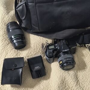 Black DSLR Camera with Accessories